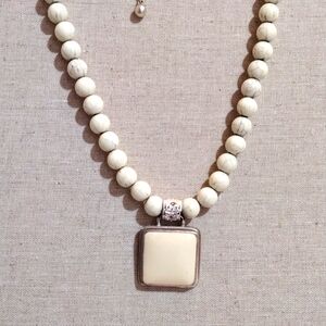 George pendant and beads necklace.